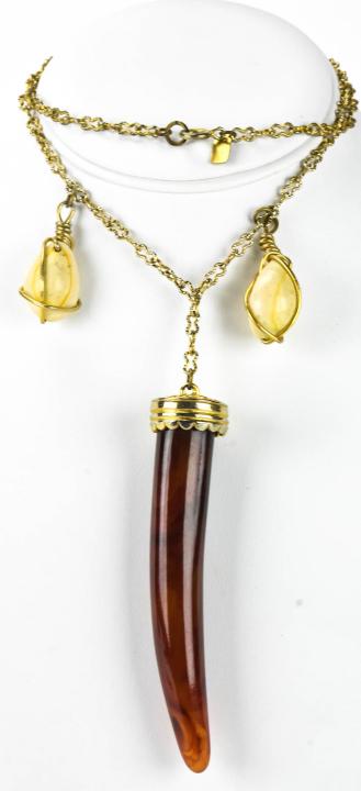 1990s Kenneth Lane Tortoise Acrylic Horn Necklace: 1990s Kenneth Lane Tortoise Acrylic Horn Necklace. Talisman pendant with shells, with tag for Kenneth Lane. Chain measures 22 inches.