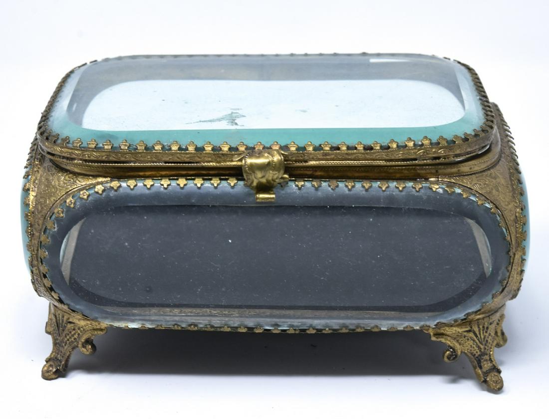 Antique French Beveled Glass Casket Jewelry Box: Antique French Beveled Glass Casket Jewelry Box. With ormolu details. Measures 3.5 inches x 6.5 inches x 4.5 inches.