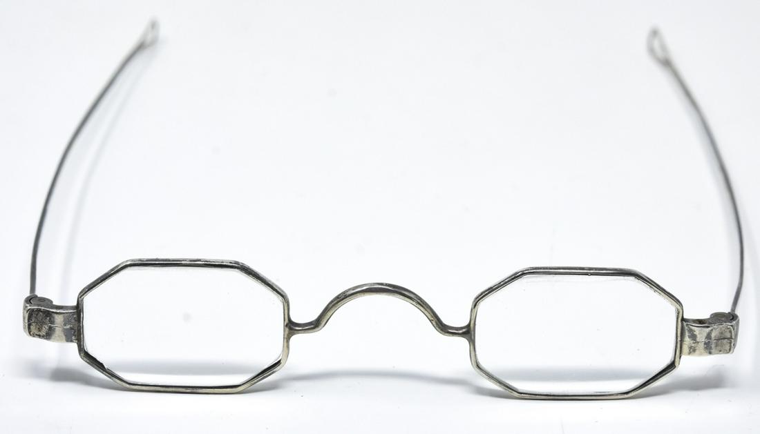 Antique Late 18th C American Silver Eye Glasses: Antique Late 18th C American Silver Eye Glasses. Signed Allister, possibly made in Philadelphia. Measures 4.5 inches wide at lenses.