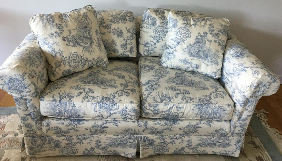 Pennsylvania House Toile Upholstered Love Seat: Pennsylvania House Toile Upholstered Love Seat. With blue and white toile fabric upholstery. Measures 26 inches x 61 inches x 36 inches.