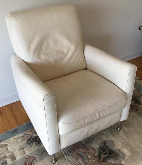 Contemporary White Leather Reclining Arm Chair: Contemporary White Leather Arm Chair. 38 inches x 29 inches x 33 inches.