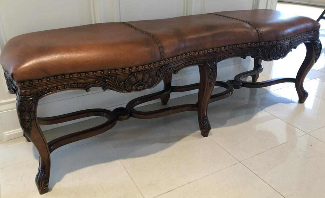 French Provencal Carved Leather Hall Way Bench: French Provencal Heavily Carved Leather Hall Way Bench with Nail Head Trim and Carved Spreaders. 6 legs. 20 inches x 61 inches x 19 inches