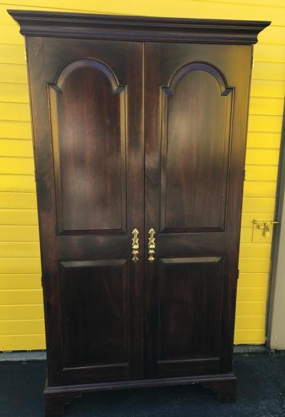 Stickley Sheraton Style Mahogany Wardrobe: Stickley Sheraton Style Mahogany Wardrobe. With pull out drawers and adjustable shelves. Measures 78 inches x 40 inches x 21 inches.
