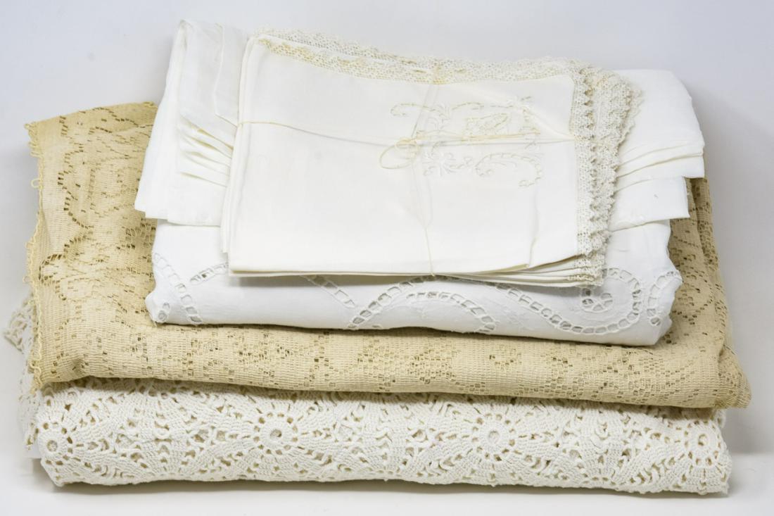Large Lot of Vintage Hand Embroidered Table Linens: Large Lot of Vintage Hand Embroidered Table Linens. Many with hand embroidered details Includes table cloths, napkins, etc.