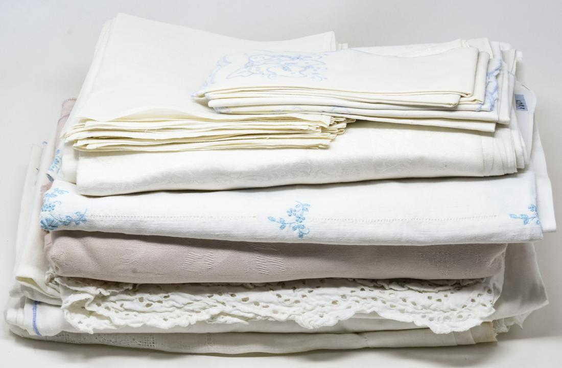 Large Lot of Vintage Hand Embroidered Table Linens: Large Lot of Vintage Hand Embroidered Table Linens. Many with hand embroidered details Includes table cloths, napkins, etc.