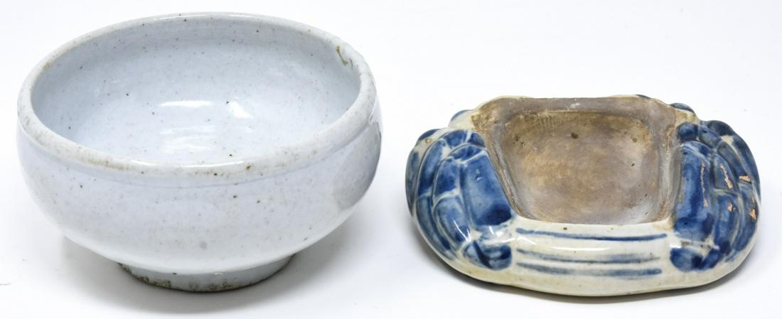 2 Chinese Porcelain Table Articles: 2 Chinese Porcelain Table Articles. Includes a blue and white ink wash and a white glazed tea bowl which measures 2.25 inches x 4.25 inches.