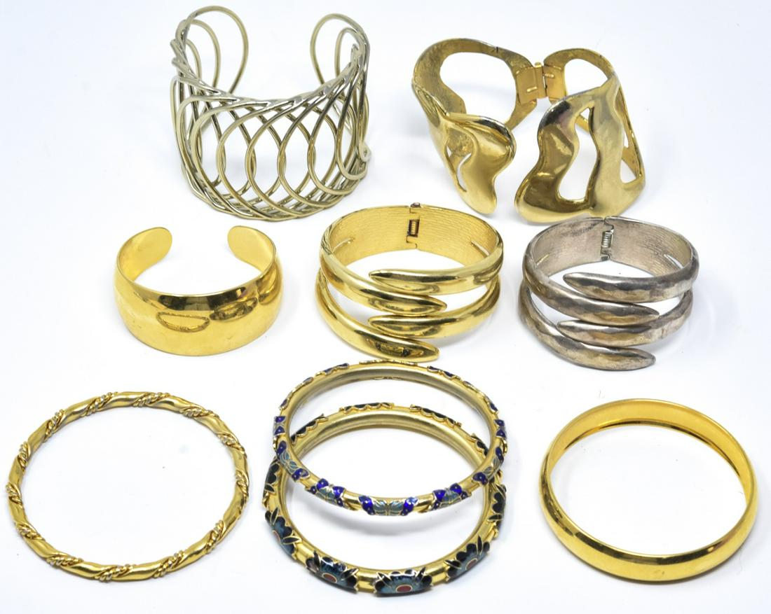 Lot of Vintage Gold Tone Costume Jewelry Bracelets: Lot of Vintage Gold Tone Costume Jewelry Bracelets. Includes one marked Monet. Includes clamper, cuff and bangle styles.