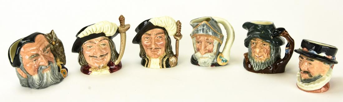 6 Royal Doulton Small Size Porcelain Toby Mugs: 6 Royal Doulton Small Size Porcelain Toby Mugs. Mugs include Athos, Merlin,Don Quixote, Porthos, Beefeater, Rip Van Winkle . Approximately 2 inches x 2 inches