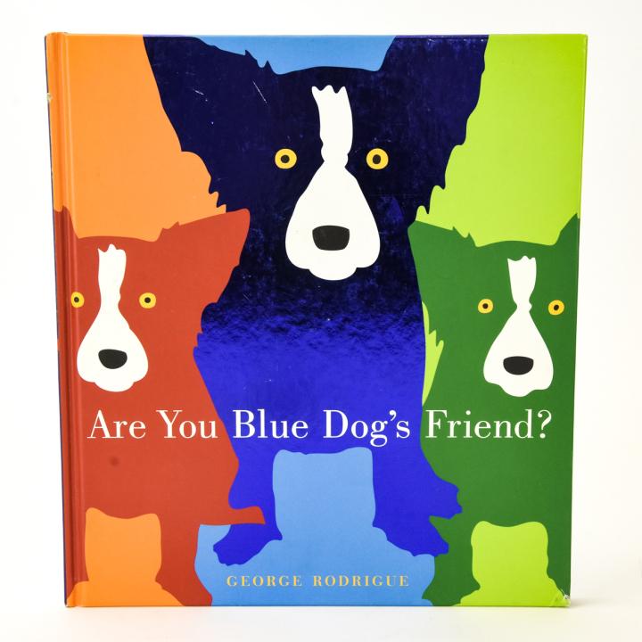 George Rodrigue Blue Dog Signed Book W Drawing: George Rodrigue Blue Dog Signed Book W Drawing. "Are You Blue Dog's Friend?" hardcover book signed by the artist and with original blue dog drawing. Measures 10.25 inches x 9.25 inches.
