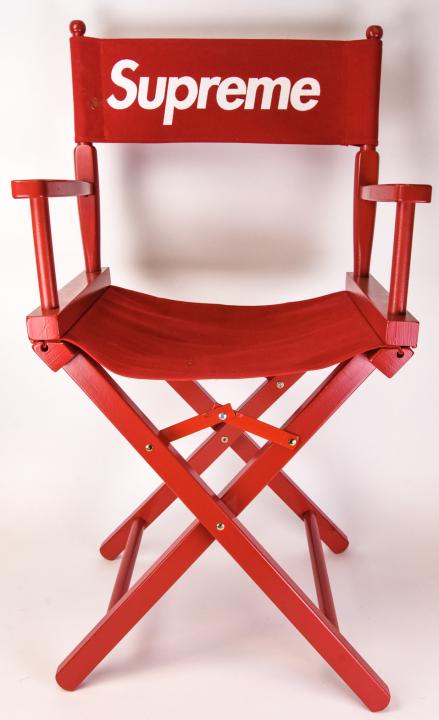 Supreme Director's Chair Red: Supreme Collapsible Director's Chair Red. Supreme directors chair. Made by Gold Medal. Measures 32.5 inches x 21 inches x 15.5 inches.