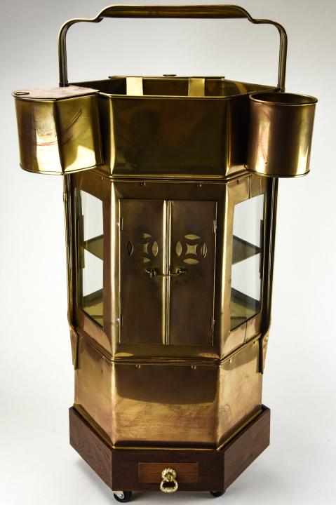 Vintage Asian Brass Rolling Tea / Bar Cart: Vintage Asian Brass Rolling Tea / Bar Cart. Compartmentalized Asian brass tea cart on wooden rolling stand. Measures 32 inches x 14 inches x 20.5 inches.