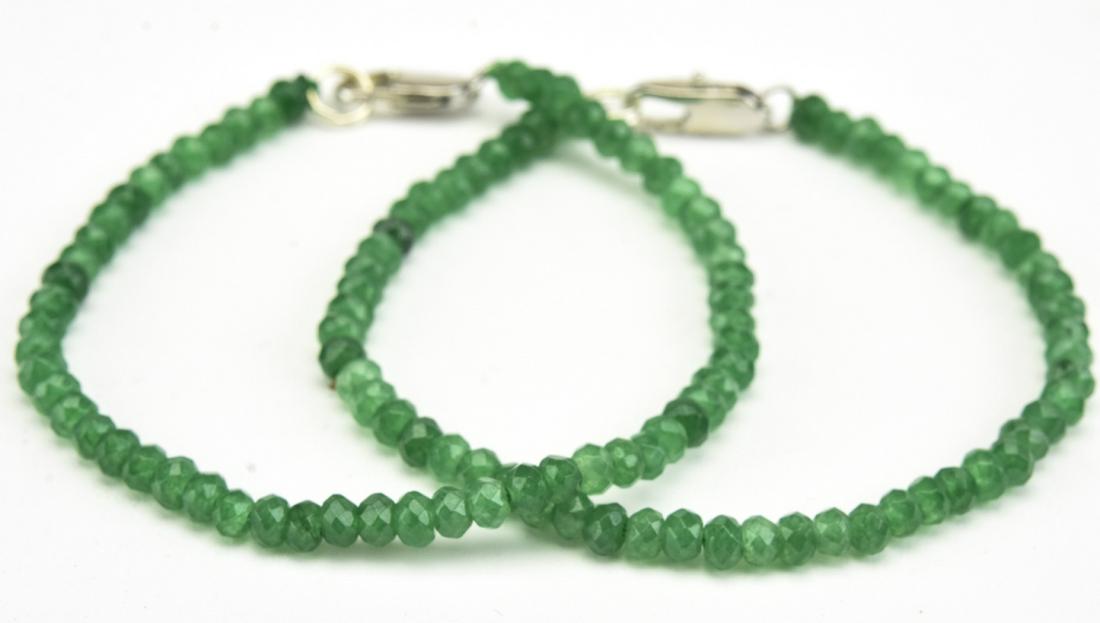 Pair of Emerald Bracelets Each w 50 Carats: Pair of Emerald Bracelets Each w 50 Carats of Beads. Each measures 7.75 inches in length. Beads show natural variation in color and test as emerald on the Presidium. May be treated / enhanced.