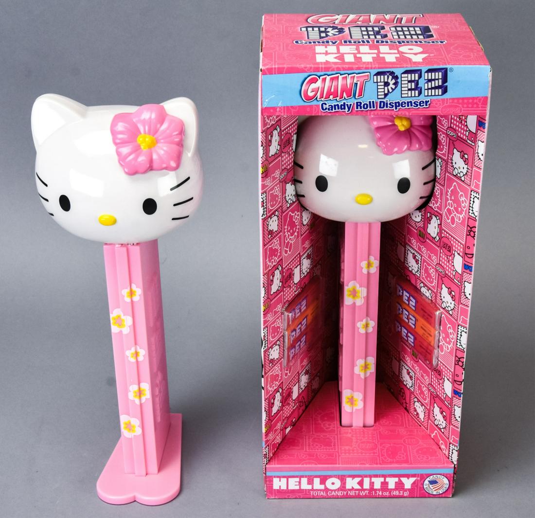 Pair Giant Hello Kitty Collectible Pez Dispensers: Pair Giant Hello Kitty Form Collectible Pez Dispensers. One in original box. 14 inches x 5 inches x 5 inches