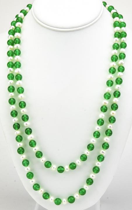 Hand Knotted Baroque Pearl & Green Jade Necklace: Hand Knotted Baroque Pearl & Green Jade Necklace. Hand knotted on white silk thread. Jade beads test as nephrite on the Presidium. Pearls are approximately 6 mm in length. Necklace measures 50 inches 