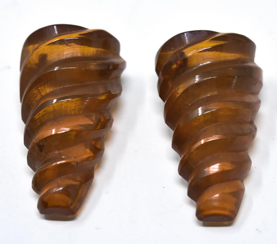 Vintage C 1940s Faux Amber Bakelite Clips: Vintage C 1940s Faux Amber Bakelite Clips. Each measures 1.5 inches in length.