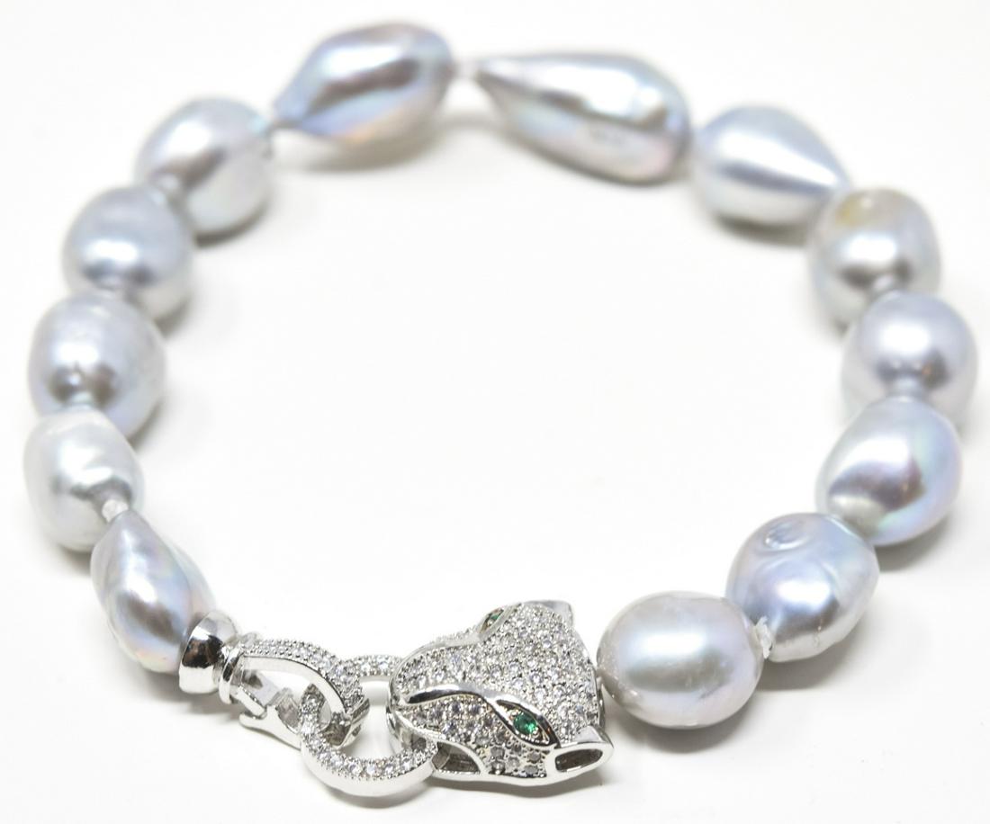 Baroque Pearl Bracelet w Pave Panther Clasp: Baroque Pearl Bracelet w Pave Panther Clasp. Hand knotted on silk thread. Measures approximately 8 inches in length.