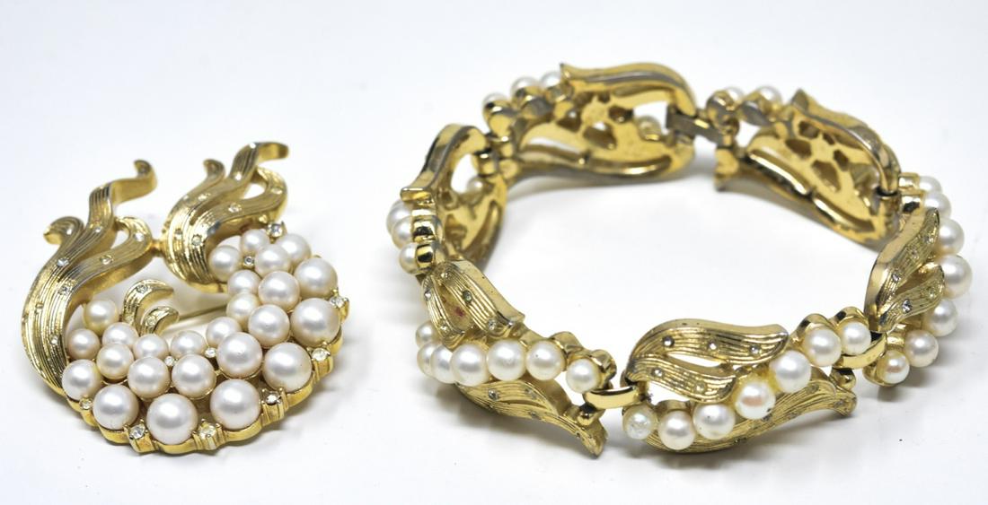 1970 Trifari Gilt & Faux Pearl Bracelet & Brooch: 1970 Trifari Gilt & Faux Pearl Bracelet & Brooch. With rhinestone accents. Bracelet measures 7.25 inches.