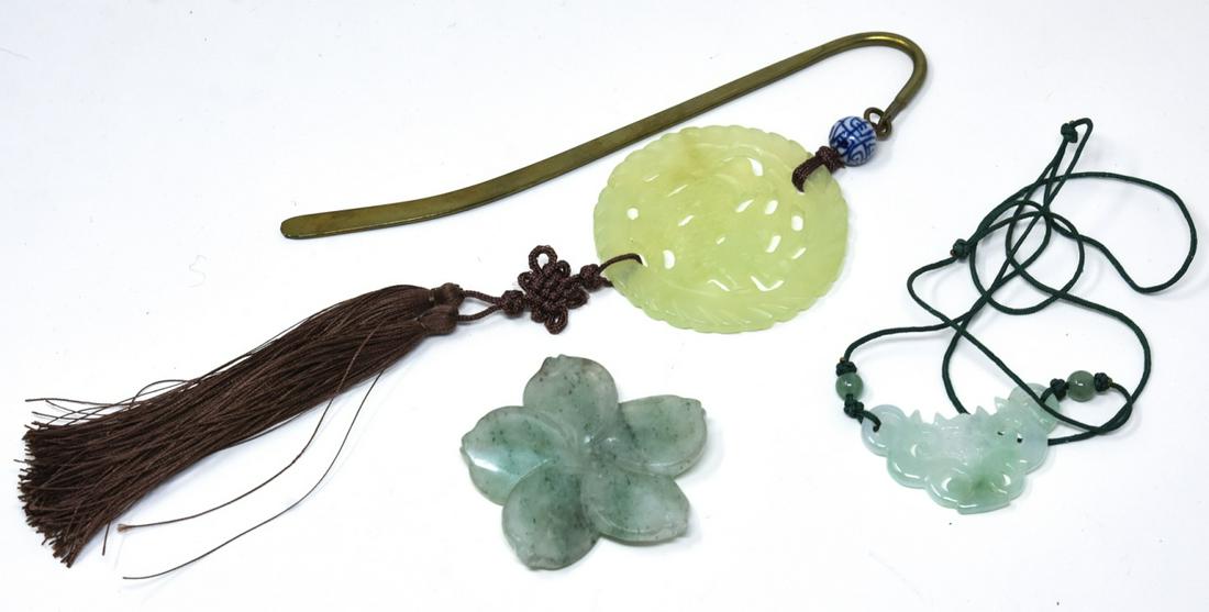 Collection of Carved Jade Pendants: Collection of Carved Jade Pendants. All test as jadeite on the presidium. Flower pendant measures nearly 2 inches.