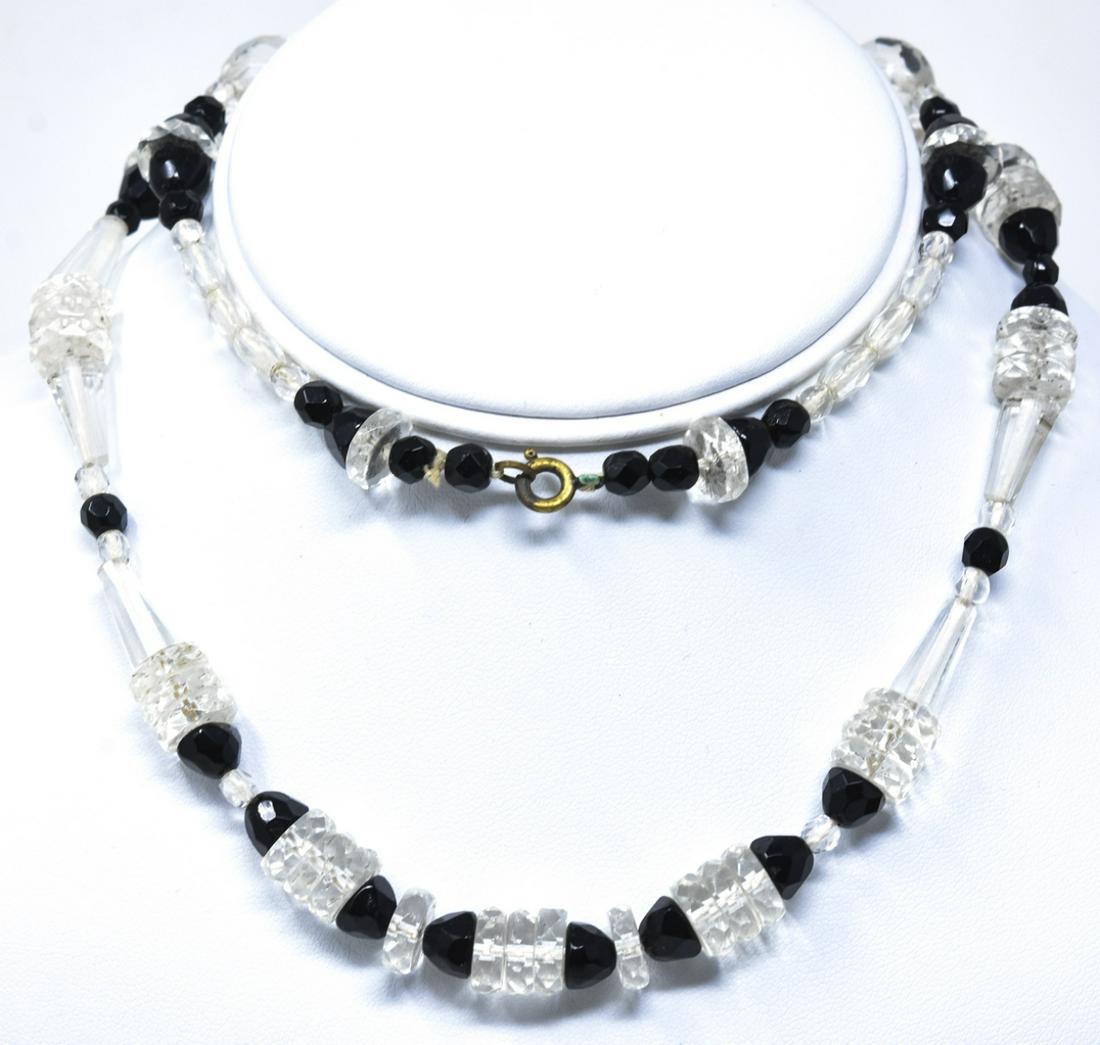 Antique Art Deco Art Glass Crystal Bead Necklace: Antique Art Deco Art Glass Crystal Bead Necklace. Measures 28 inches in length.