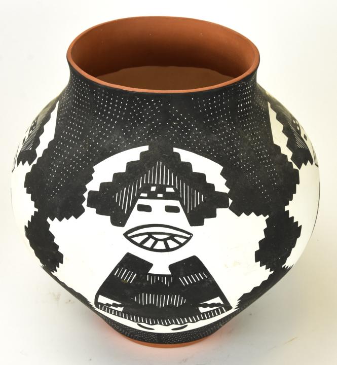 Vintage Indian Terra Cotta Pottery Laguna, NM: Vintage Indian Terra Cotta Pottery Laguna, NM. Signed by the artist J. Diaz, Laguna, New Mexico. 10 inches x 10 inches in diameter.