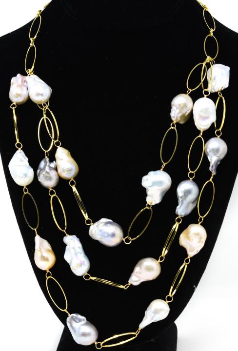 Three Tier Necklace w Large Cultured Baroque Pearl: Three Tier Necklace w Large Cultured Baroque Pearls. Set with seventeen large cultured baroque pearls in high luster iridescent tones of white, pink, champagne. Largest pearl is approximately 22 mm in