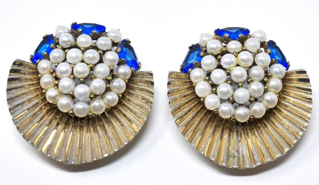 Pair of Retro Marcel Boucher Sterling Fur Clips: Pair of Vintage / Retro Marcel Boucher Sterling Fur Clips. Gold over sterling silver with faux pearls and sapphire paste stones. Signed / hallmarked on back. Each measures 1.5 inches in length. Retro