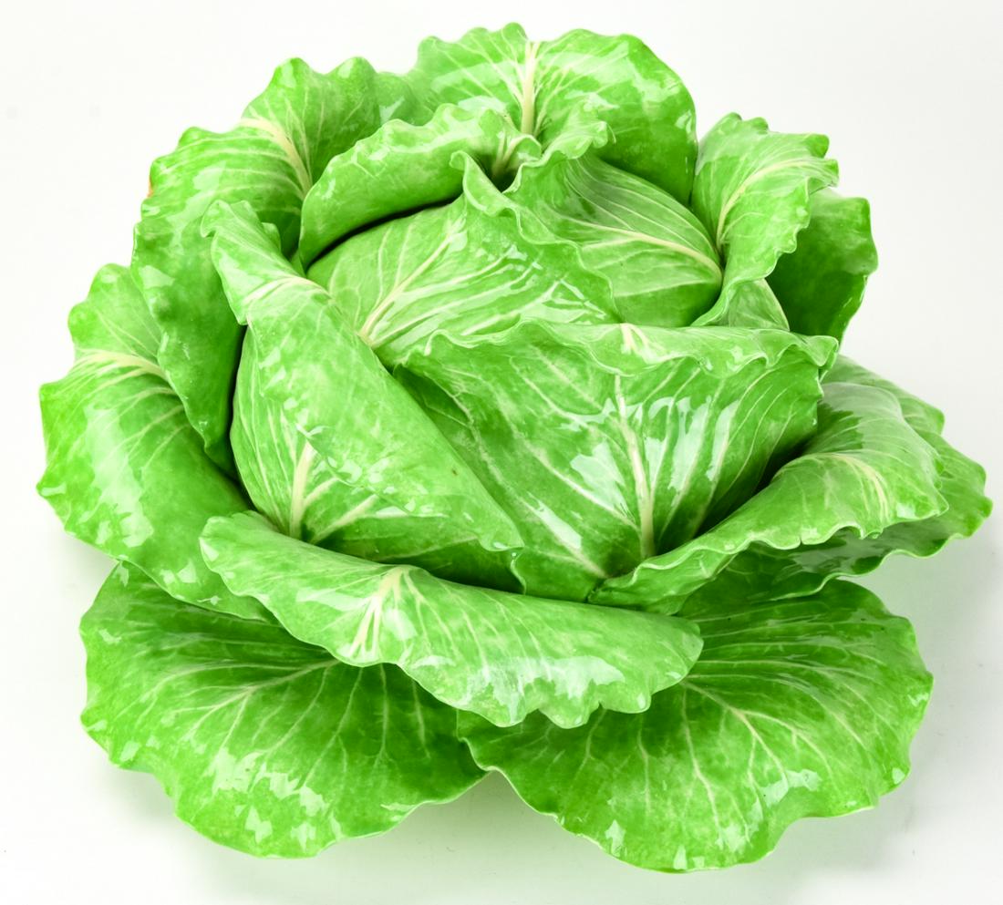 Dodie Thayer Lettuce Form Tureen & Underplate: Dodie Thayer Lettuce Form Tureen & Underplate. Under plate measures 16.5 inches in diameter. Tureen measures approximately 7.5 x 13 inches. Signed.