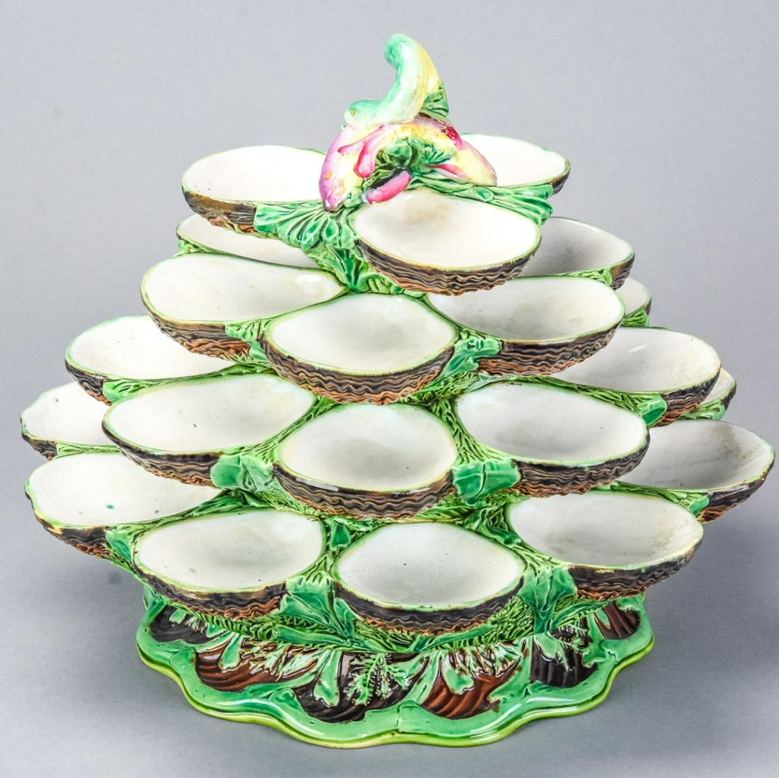 Minton Majolica Four Tiered Revolving Oyster Stand: Minton Majolica Four Tiered Revolving Oyster Stand. Signed on bottom. Measures 10.5 x 12.5 inches. Hand painted, late 19th century, fish form finial.