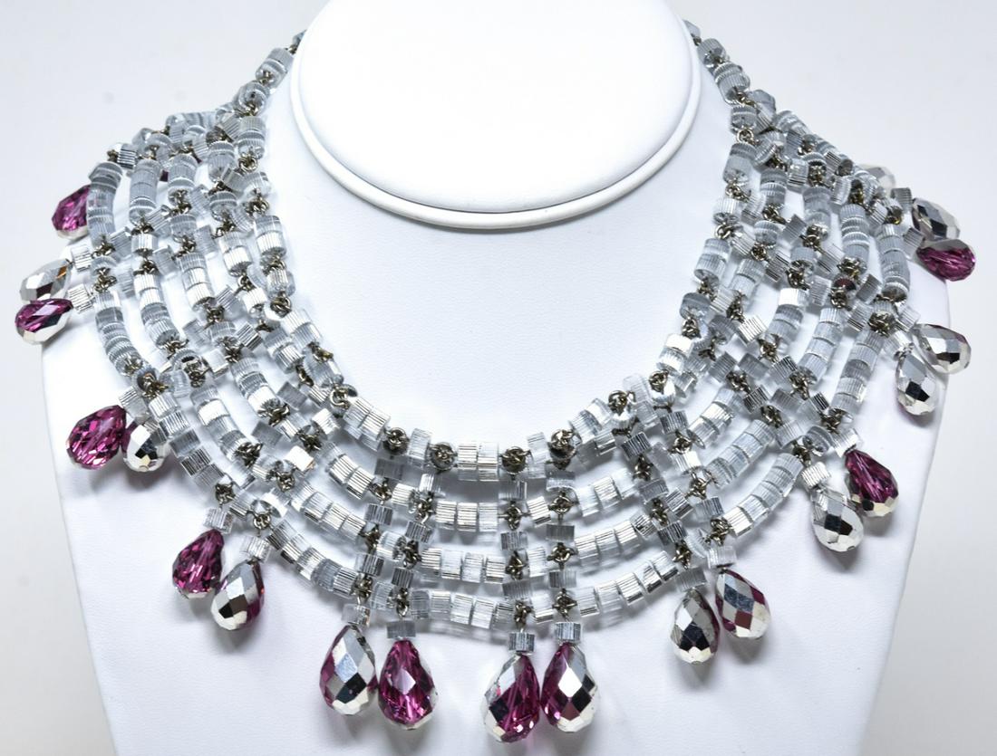 C 1960 French Parurier Silver Foiled Bead Necklace: C 1960 French Parurier Silver Foiled Bead Necklace. Silver foiled ribbed beads with foiled pink briolette drops, all on wire. Measures 14.25 inches.