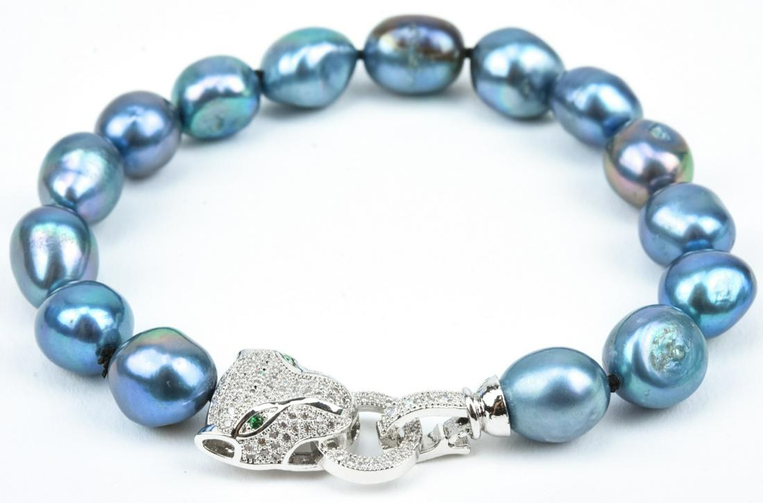Silver Baroque Pearl Bracelet w Pave Panther Clasp: Silver Baroque Pearl Bracelet w Pave Panther Clasp. Hand knotted. Measures 8 inches in length.
