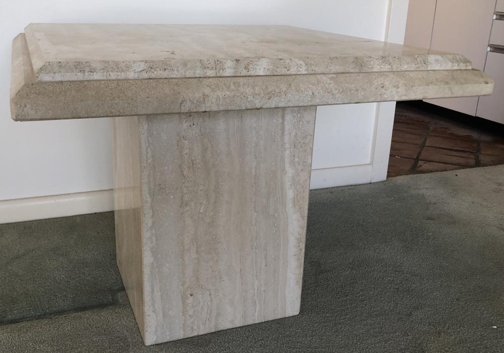 Mid Century Travertine Carved End Table: Mid Century Travertine Carved End Table. Travertine top and base. Made in Italy. 22 inches x 28 inches x 28 inches