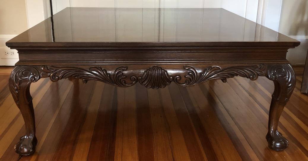 Carved Rococo Style Ball & Claw Foot Coffee Table: Heritage Heirlooms Carved Rococo Style Ball & Claw Foot Coffee Table. Carved table apron and legs. Book matched flame mahogany surface.18 inches x 40 inches x 40 inches