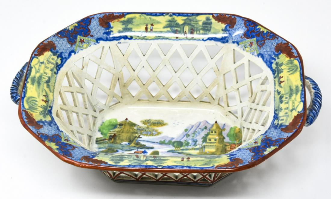 Antique 19th C Ironstone Imari Motif Basket: Antique 19th C Ironstone Imari Motif Basket w Handles. Reticulated ironstone with transferware scenes of Japanese / Asian imari patterns. Measures 3.5 x 10 x 7 inches.
