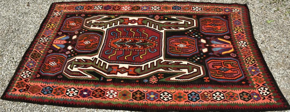 Antique Turkish Kilim Geometric Motif Carpet: Antique Turkish Kilim Geometric Motif Carpet. Having a patterned border surround a central rectangular plaque of geometric designs. Measures approximately 113.5 x 68 inches.