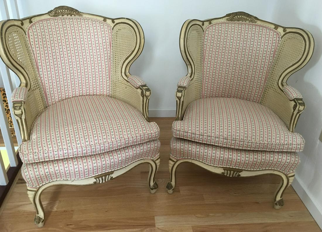 2 Child Size Wingback Arm Chairs: 2 Child Size Wingback Arm Chairs. Pair child size wing back arm chairs with caned details and upholstery. Measures 30 inches x 21 inches x 20 inches.