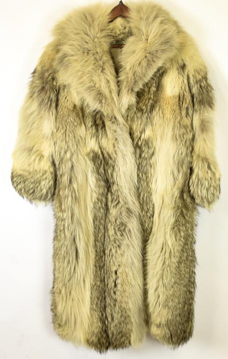 Vintage Coyote Fur Driving Length Coat: Vintage Coyote Fur Driving Length Coat. 45 inches long, 18 across shoulders, sleeves are 22 inches long.