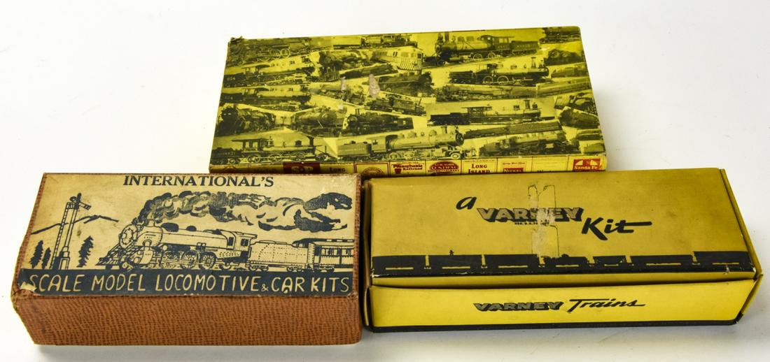 3 Vintage Model Train Kits in Original Boxes: 3 Vintage Model Train Kits in Original Boxes. One Varney Train Car, One International's Scale Model Locomotive, and one box of model railroad ties. Boxes are about 2 inches x 6 inches.