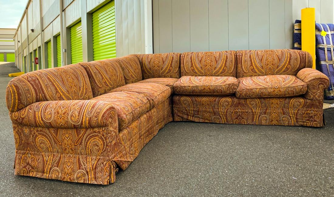 Contemporary Custom Made L Shaped Sectional Sofa: Contemporary Custom Made L Shaped Sectional Sofa w Paisley Fabric. Some wear to frame but a great custom made form / frame. Measures 32 x 99 x 101 inches approximately. Property of a designer decorate
