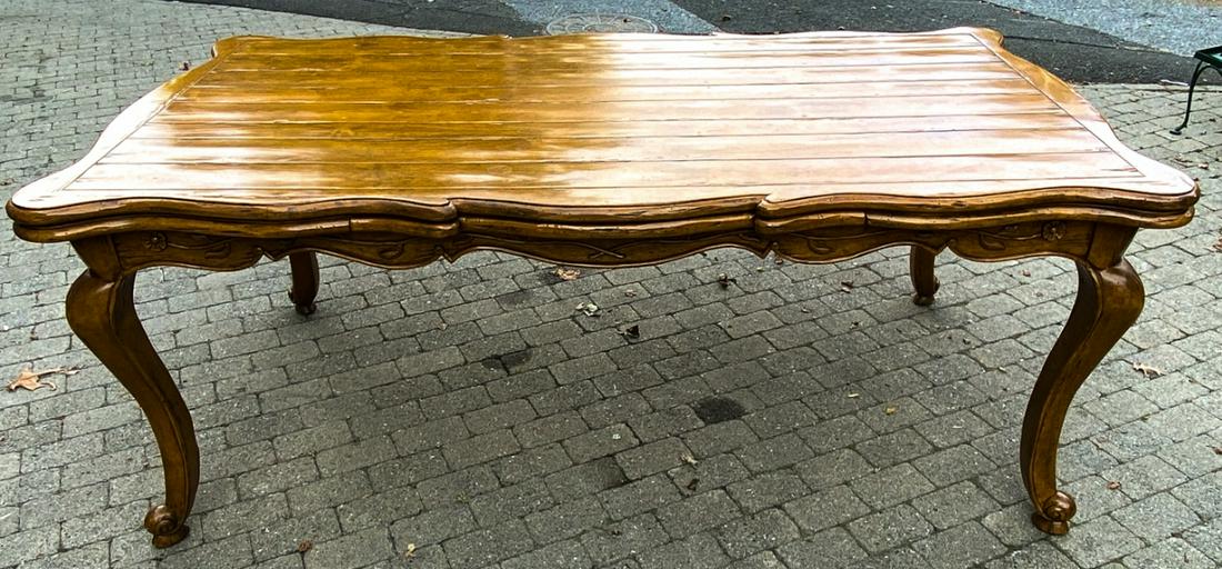Bausman & Company Custom Made Farm Table: Bausman & Company Custom Made Farm Table w Leaves. Hand carved apron and cabriole legs. French Country Provencal style. Measures 30.5 x 76 x 43 inches without the leaves extended.