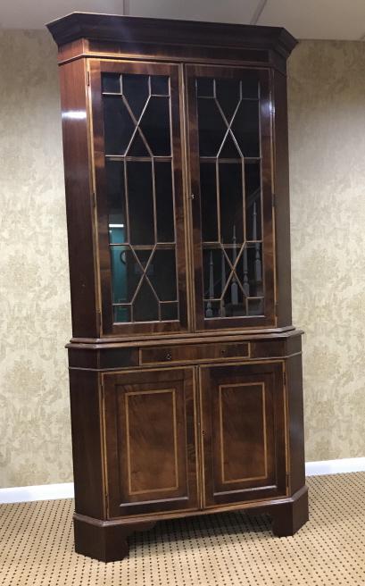 English Custom Made Chippendale Corner Cabinet: English Custom Made Chippendale Corner Cabinet. Custom made in England by the consignor. Measures 82 x 41 x 24 inches.
