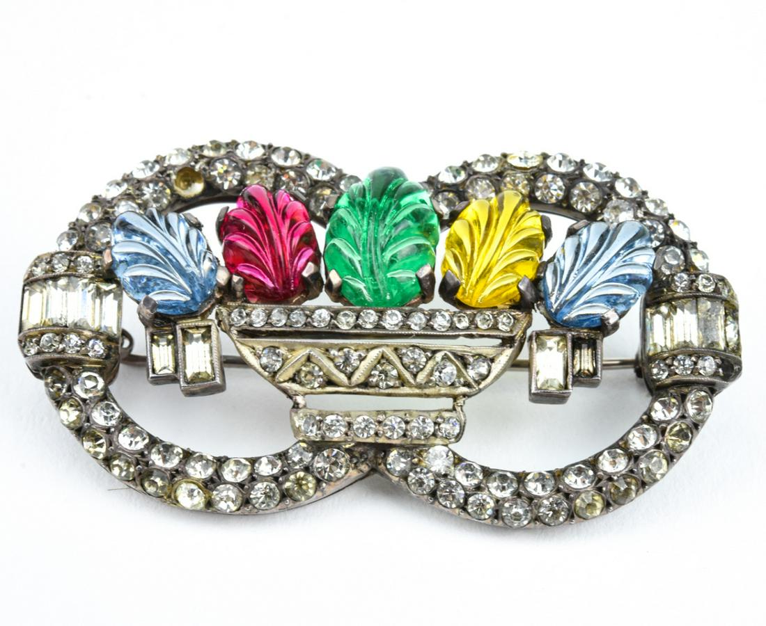 Vintage Giardinetto Sterling Silver Paste Brooch: Vintage Giardinetto Sterling Silver Paste Brooch. Hallmarked STERLING, possibly marked GERMANY. Featuring five colored glass leaves. Measures 2.25 inches in width.