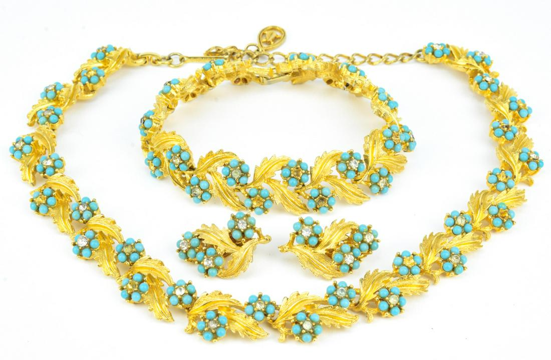 Vintage Costume Jewelry Gilt Parure by Kramer: Vintage Costume Jewelry Gilt Parure by Kramer w Faux Turquoise. Signed. Clip on earrings, bracelet and necklace. Necklace measures 16 inches in length.