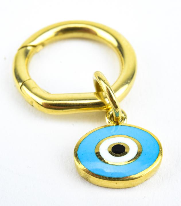 Aaron Basha 18k Yellow Gold Evil Eye Charm: Aaron Basha 18k Yellow Gold Evil Eye Charm – In 18k yellow gold marked 750. Signed Aaron Basha with enamel. About 4.3 grams inclusive. Provenance: From a prominent Westchester Jewelry Store.