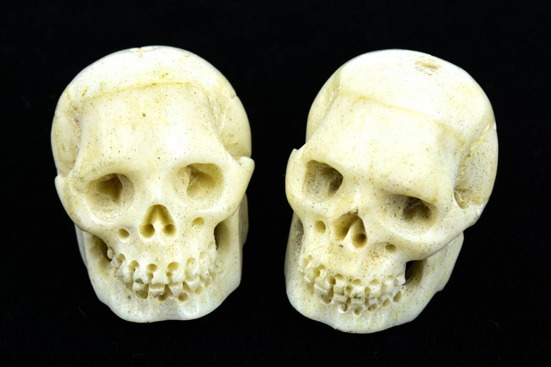 Pair Memento Mori Skull Pendants w Carved Bone: Pair Memento Mori Skull Pendants w Carved Bone. Well detailed. Both drilled and can be used in jewelry. Each measures 1 inch in length.