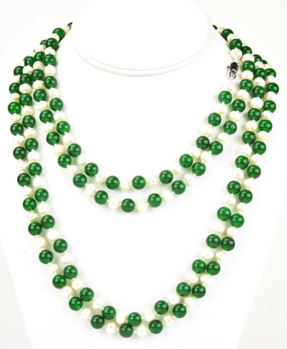 85 Inch Hand Knotted Jade & Baroque Pearl Necklace: 85 Inch Hand Knotted Jade & Baroque Pearl Necklace. Hand knotted on white silk thread. Featuring reen nephrite jade beads and baroque pearls. Measures approximately 85 inches in length.