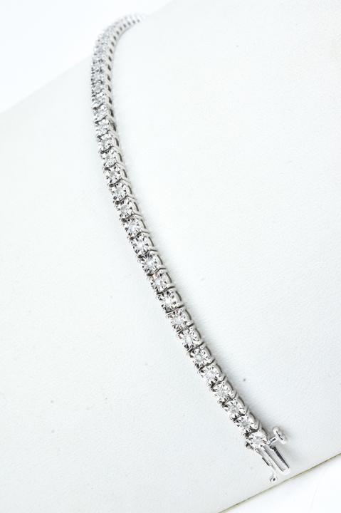 Vintage 10k White Gold and Diamond Tennis Bracelet: Vintage 10k White Gold and Diamond Tennis Bracelet – Stunning and sparkly! Approximately 7 x .125 inches and 10.4 grams inclusive. Provenance: From a prominent Westchester Jewelry Store.