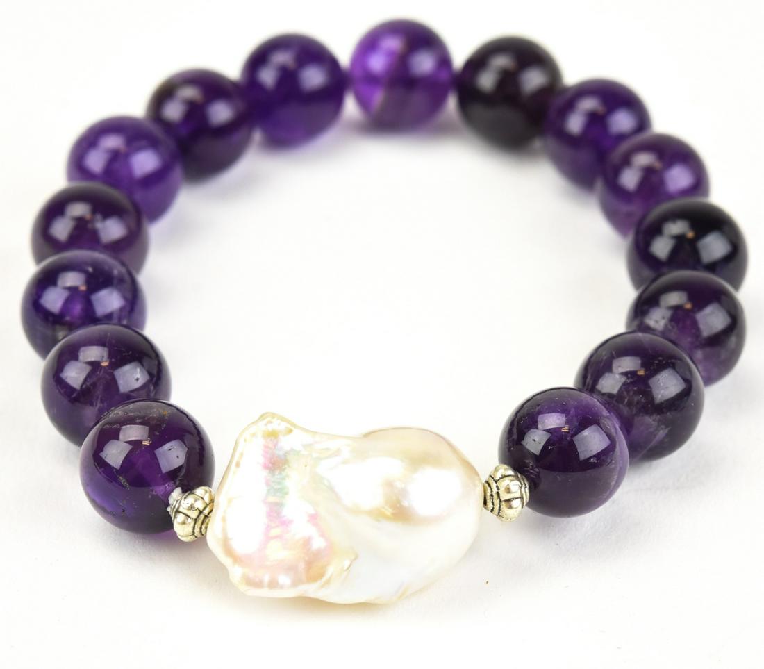 Amethyst & Large Cultured Baroque Pearl Bracelet: Amethyst & Large Cultured Baroque Pearl Bracelet. Pearl is approximately 22 mm in length.
