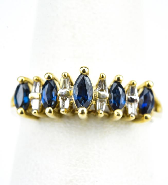 Vintage 14k Yellow Gold Sapphire and Diamond Ring: Vintage 14k Yellow Gold and Sapphire and Diamond Ring – A stunning half hoop ring set with marquis set diamonds and sapphires. High gallery. Approximately a size 6.5. Provenance: From a prominent We