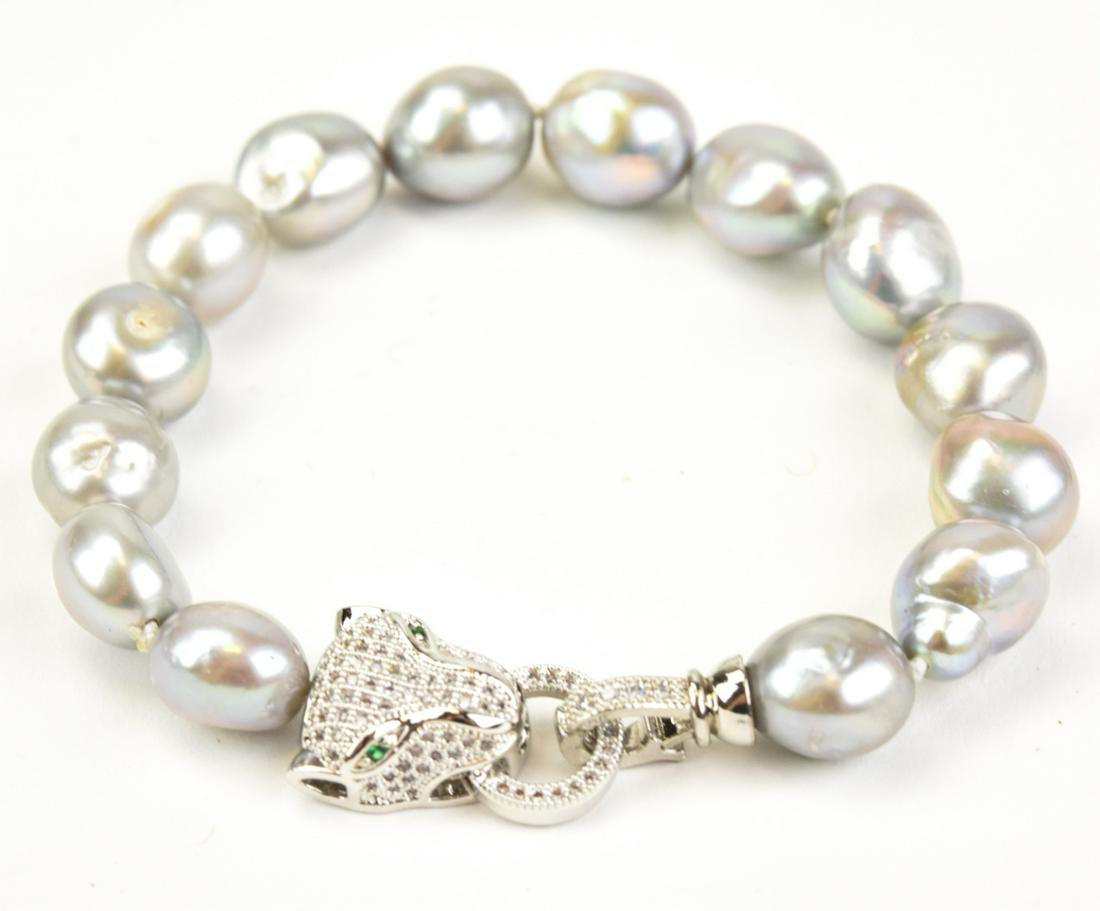 Baroque Pearl Bracelet w Pave Set Panther Clasp: Baroque Pearl Bracelet w Pave Set Panther Clasp. Hand knotted on silk thread. Measures just over 8 inches in length.