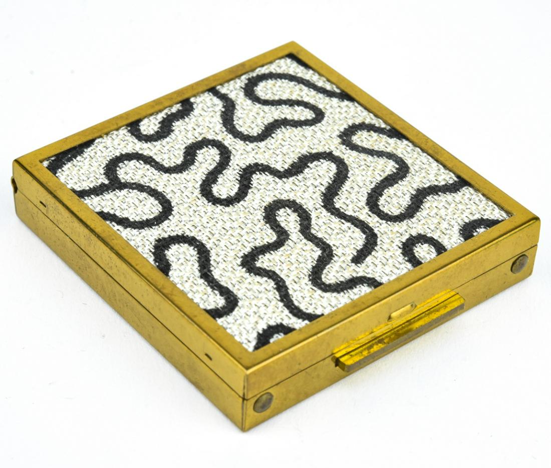 Vintage Ormolu Tapestry 5th Avenue Makeup Compact: Vintage Ormolu Tapestry 5th Avenue Makeup Compact. Interior marked Fifth Avenue. Measures 2.25 inches in length.